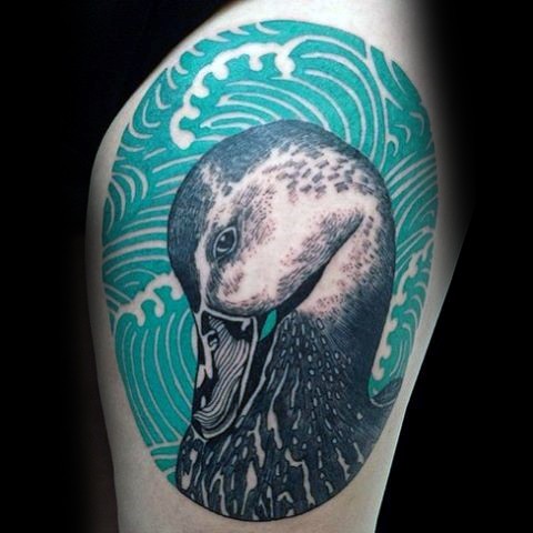 Illustrative style colored thigh tattoo of duck