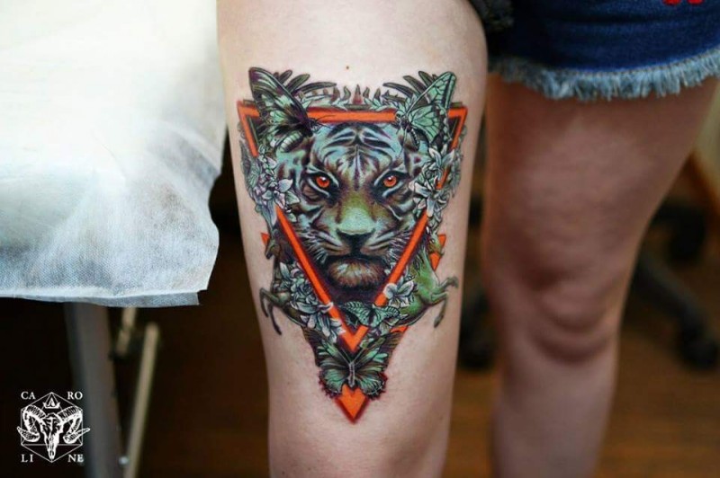 Illustrative style colored thigh tattoo of wild cat with triangle and butterflies