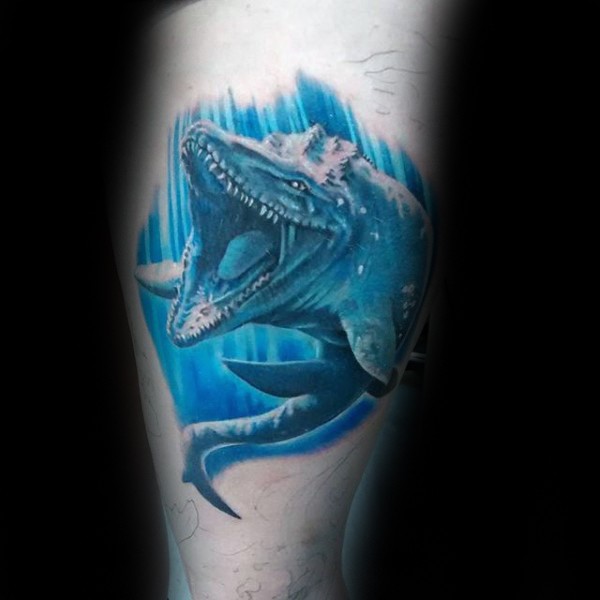 Illustrative style colored thigh tattoo of creepy prehistoric alligator