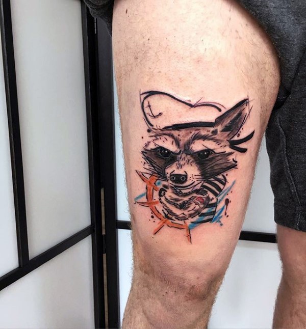 Illustrative style colored thigh tattoo of raccoon sailor