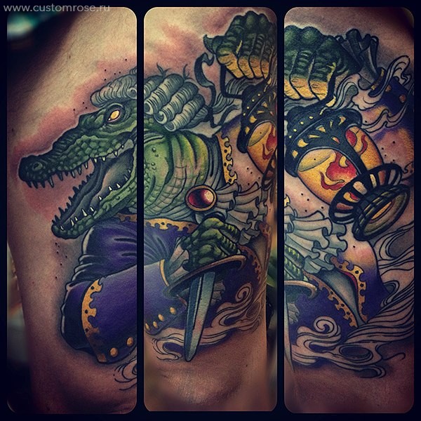 Illustrative style colored thigh tattoo of mystical alligator with knife and old lighter