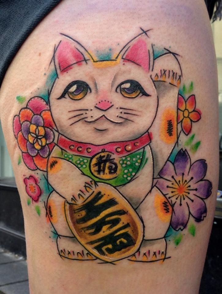 Illustrative style colored thigh tattoo of maneki neko japanese lucky cat with beautiful flower