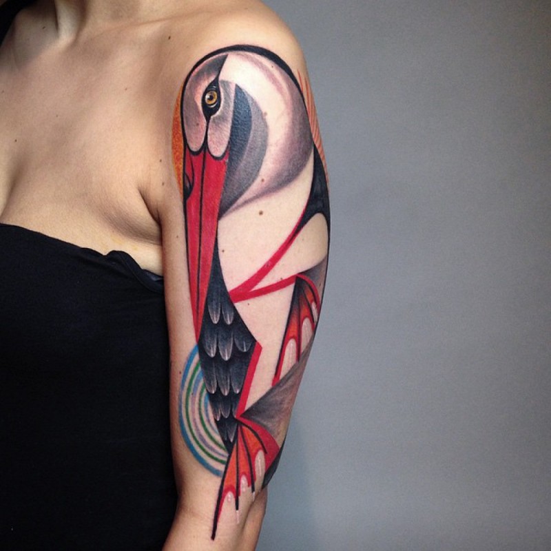 Tatuaggio del braccio superiore colorato con stile illustrativo