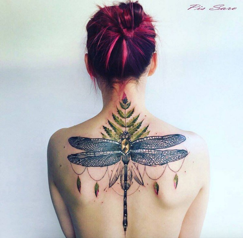 Illustrative style colored upper back tattoo of big dragonfly