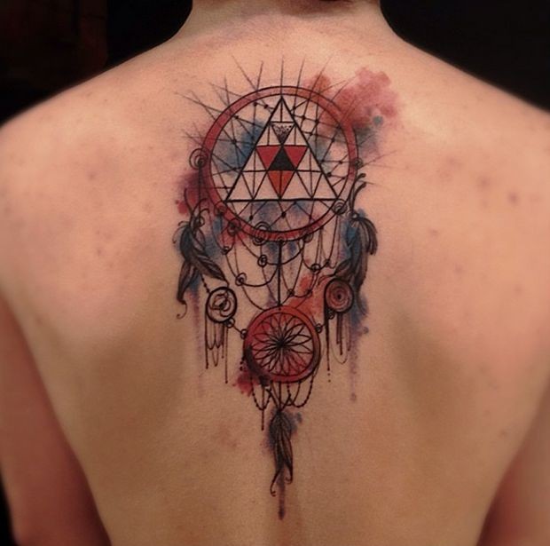 Illustrative style colored whole back tattoo of dream catcher