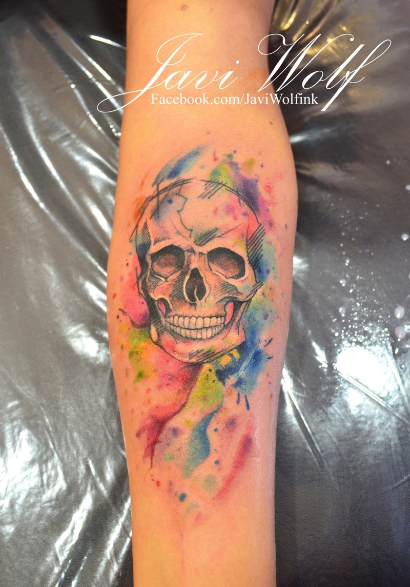 Illustrative style colorful forearm tattoo of human skull