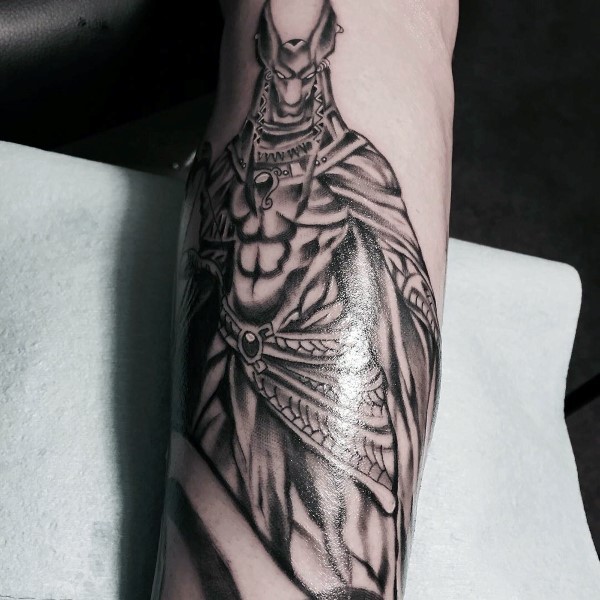 Illustrative style detailed arm tattoo of Egypt God