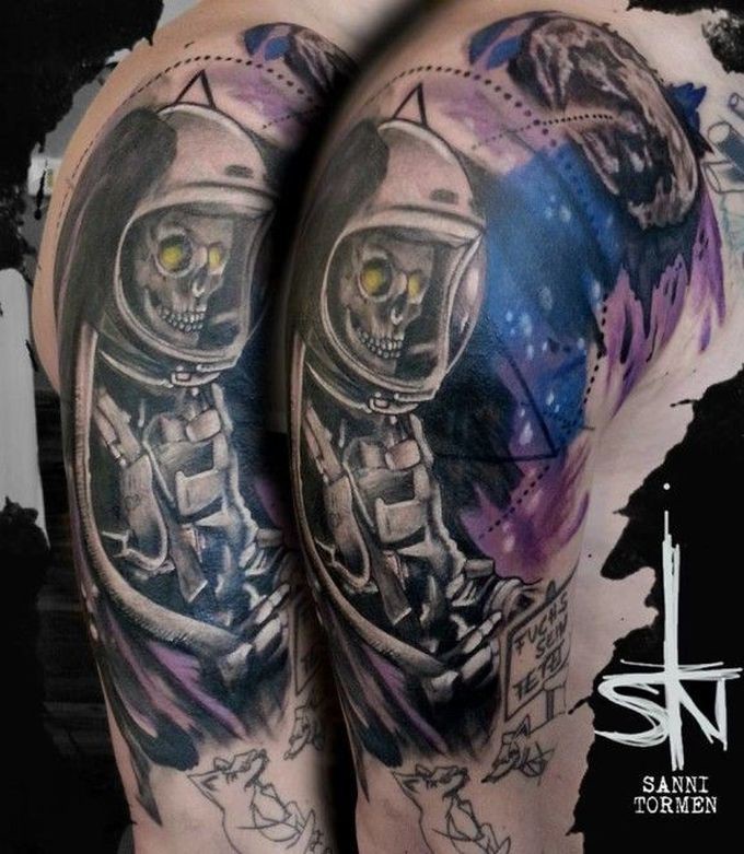 Illustrative style half colored shoulder tattoo of astronaut skeleton with lettering
