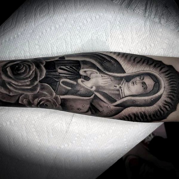 Illustrative style interesting looking forearm tattoo of praying woman with rose