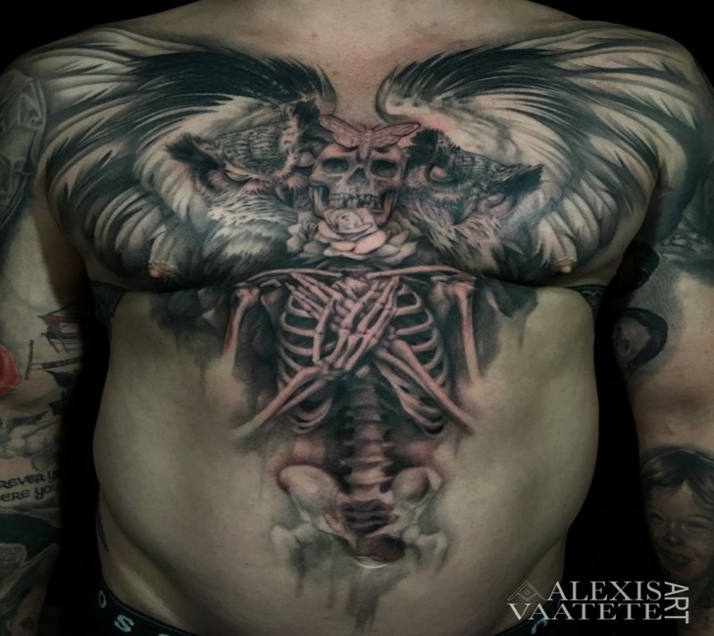 Impressive black and white large chest and belly tattoo of woman skeleton with wings