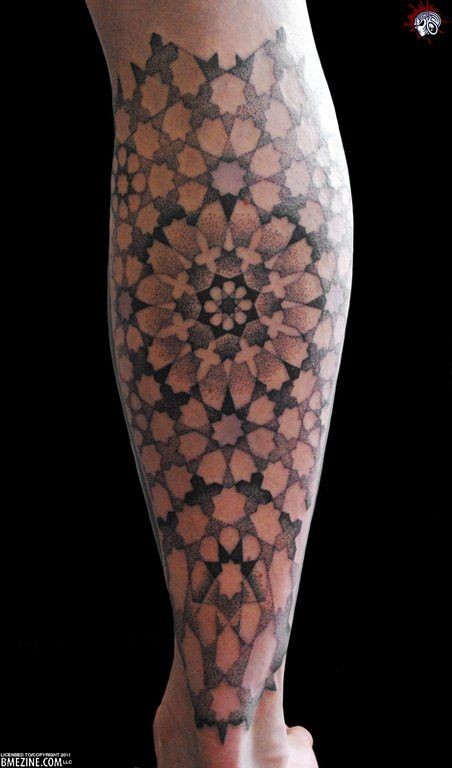 Impressive designed and painted big floral ornament tattoo on leg