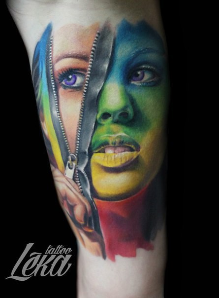 Impressive looking colored arm tattoo woman face with zipper