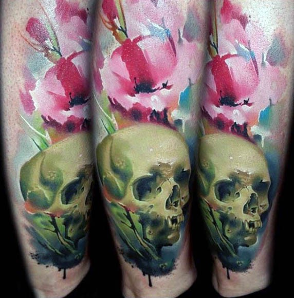 Impressive multicolored skull with flower tattoo on leg