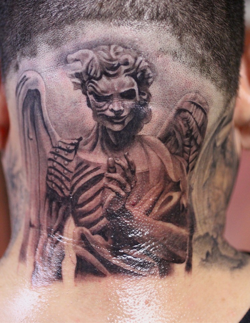 Impressive unique designed colored monster angel tattoo on neck