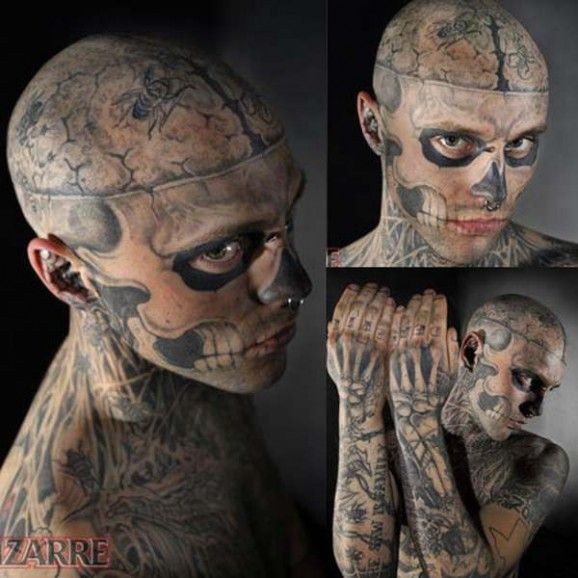 Impressive very detailed monster skeleton tattoo on whole body