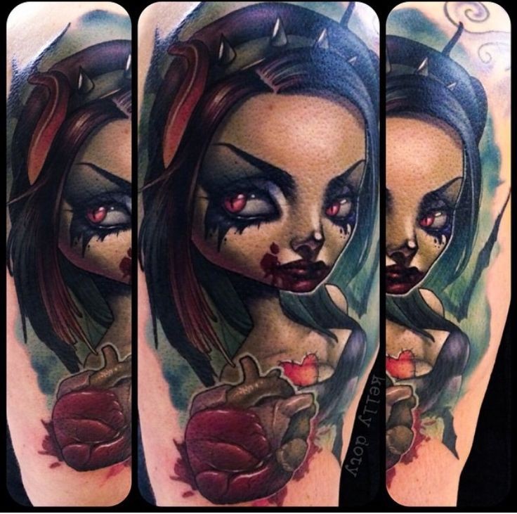 Tatuaje en el brazo, chica monstruosa  tremenda con corazón humano