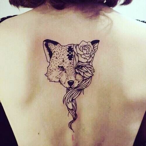 Incredible black ink fox tattoo on upper back stylized with rose flower