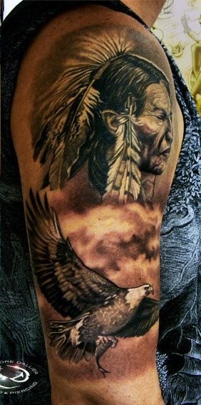 Incredible colored old Indian portrait tattoo on half sleeve with eagle