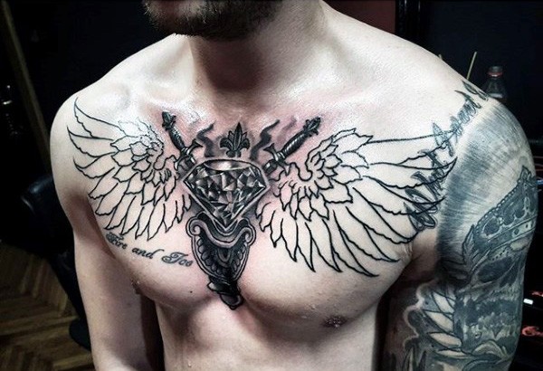 Incredible designed black ink diamond with wings and lettering tattoo on chest