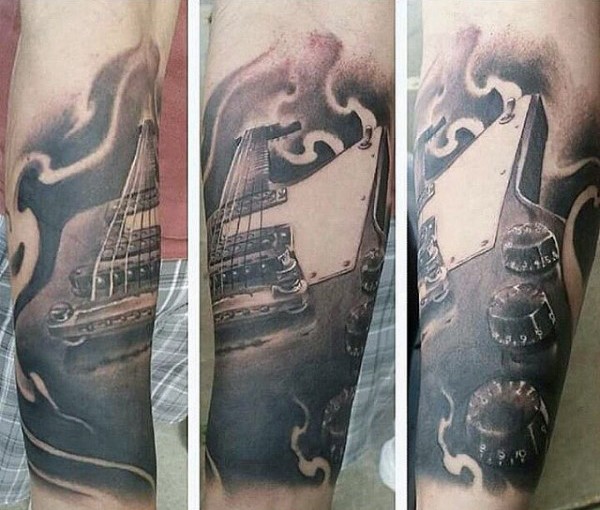 Incredible detailed massive black ink guitar tattoo on arm