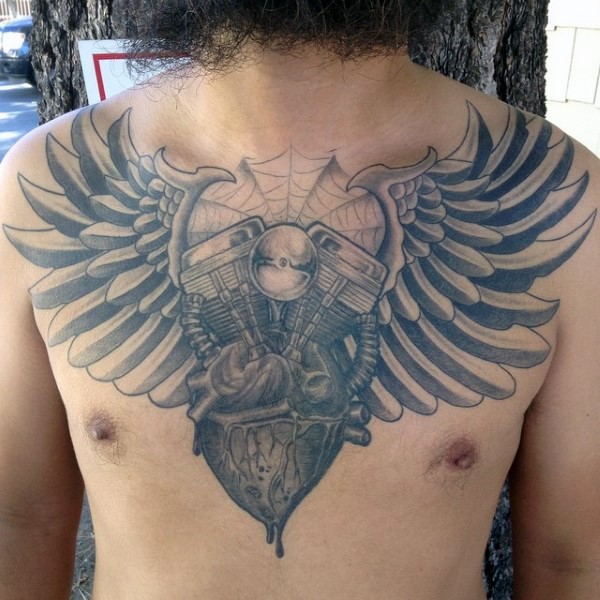 Incredible gray washed style bike engine with human heart and wings tattoo on chest