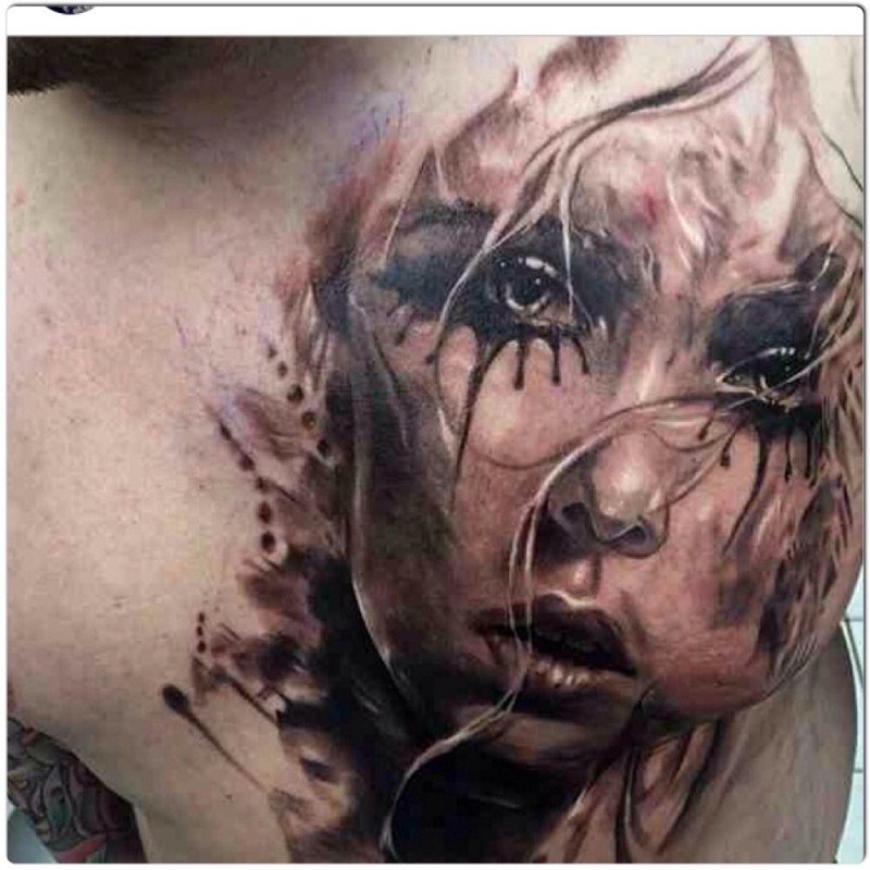 Incredible looking colored chest tattoo of crying woman face