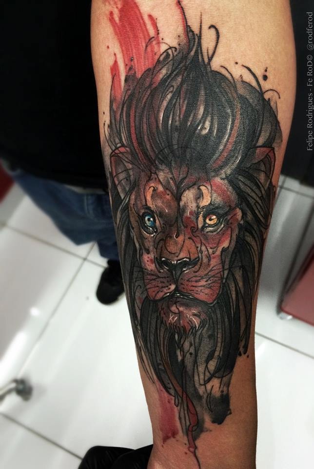 Incredible looking colored forearm tattoo of lion head