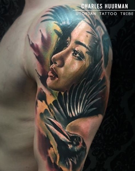 Incredible looking colored shoulder tattoo of woman with crow