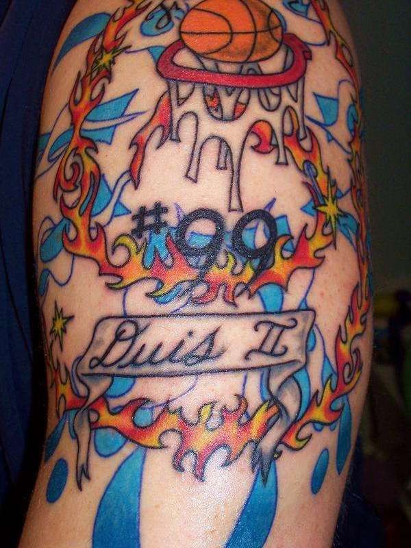 Incredible multicolored shoulder tattoo of lettering and flames