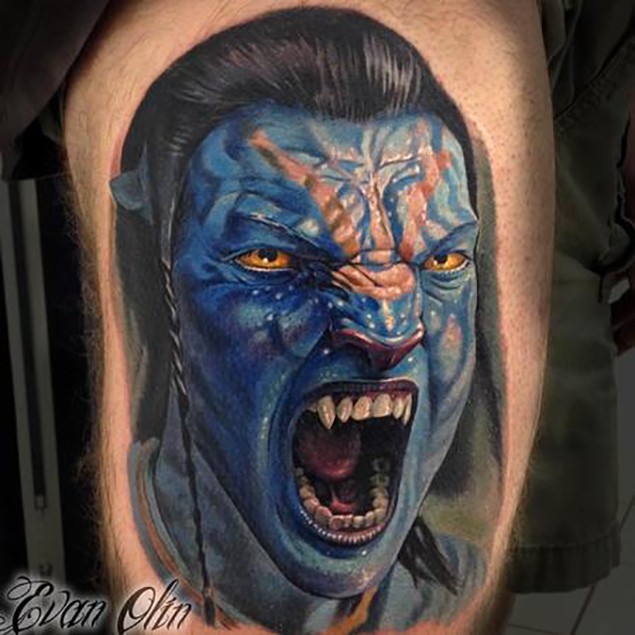Incredible natural looking colored Avatar main hero tattoo