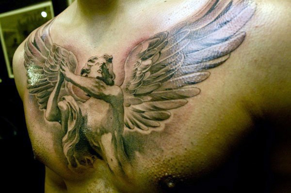 Incredible painted black ink angel tattoo on chest