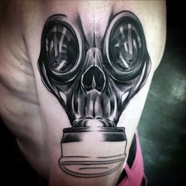 Incredible skull shaped shoulder tattoo of modern gas mask