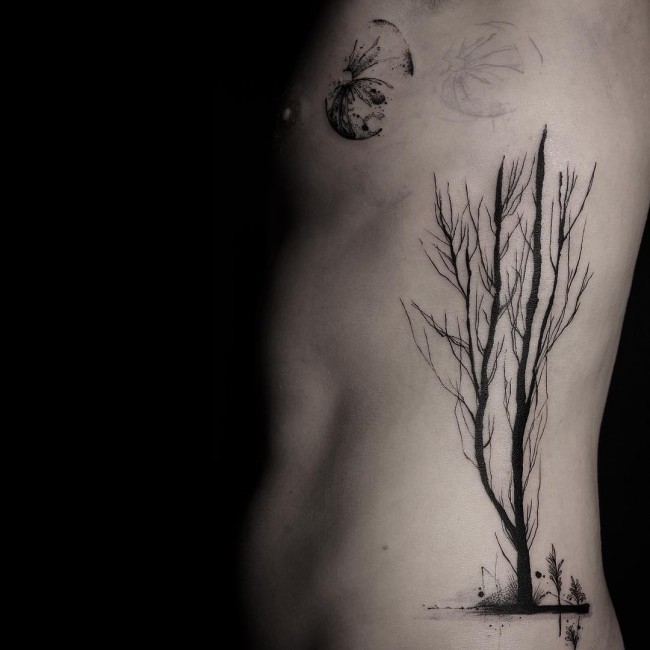 Incredible style painted black ink lonely big tree tattoo on side with moon