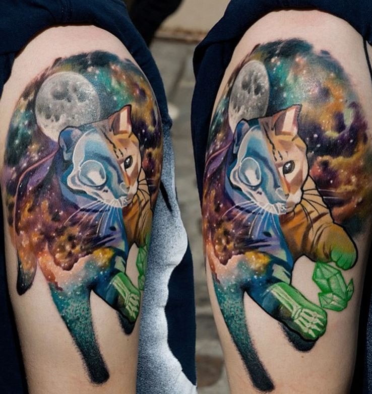 Incredible unusual looking multicolored shoulder tattoo of X-Ray like space cat