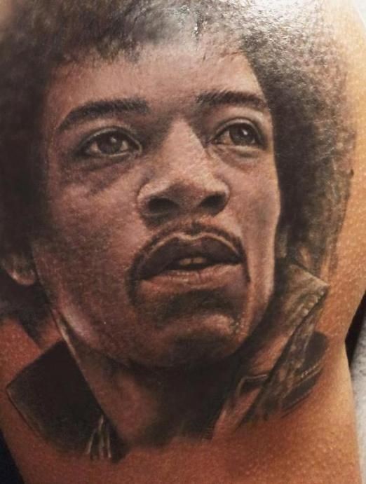 Incredible young Jimi Hendricks realistic portrait tattoo in realism style
