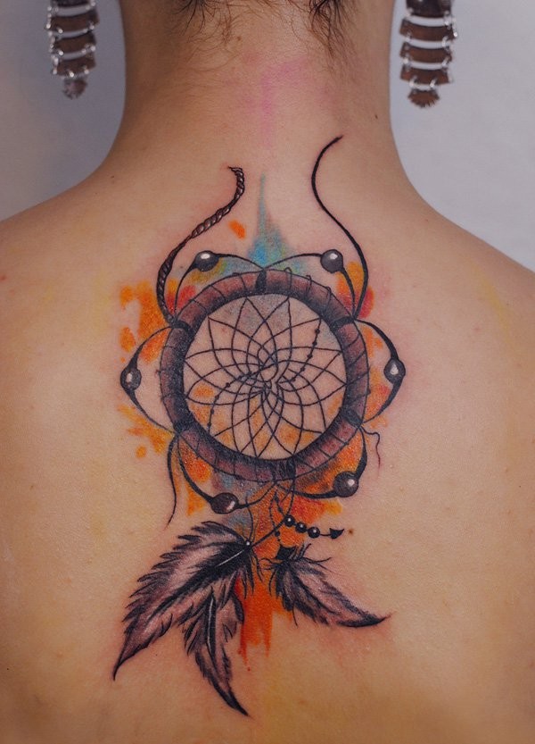 Indian dream catcher accurate upper back tattoo with colorful watercolor paint drips