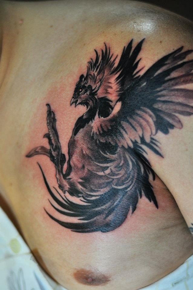 Ink black rooster tattoo with shadows