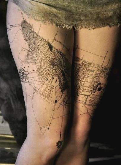 Interesting black and white interesting ornaments tattoo on thighs