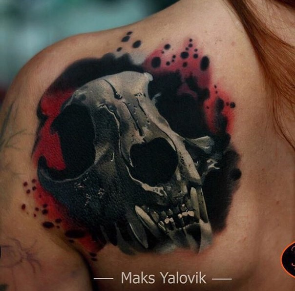 Interesting colored shoulder tattoo of big cat skull