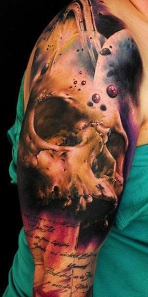Interesting combined detailed massive skull in space tattoo on shoulder