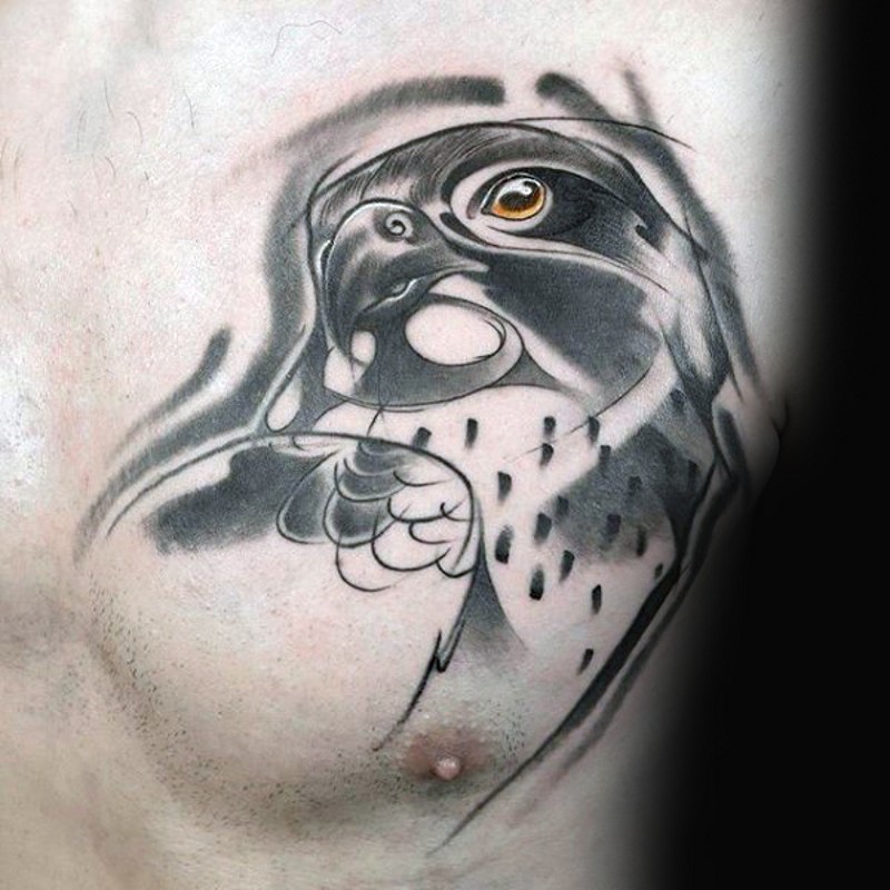 Interesting design eagle's head tattoo on chest with dark haze