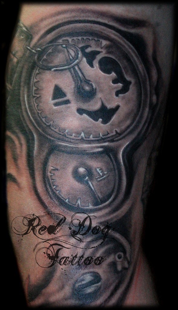 Interesting designed colored arm tattoo of mystical dials