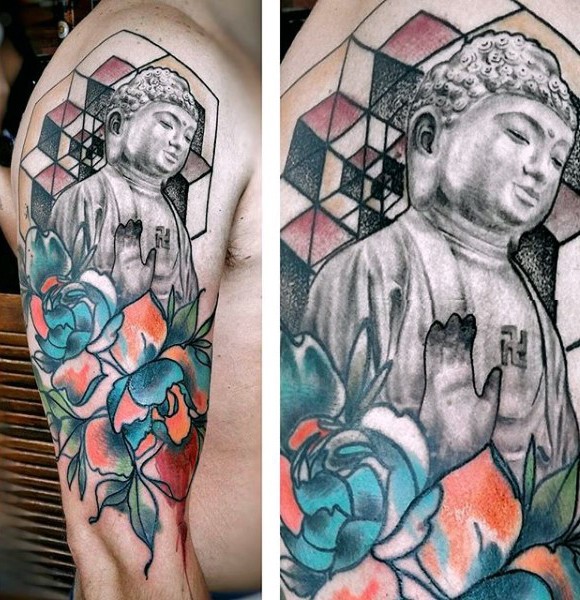 Interesting half colored Buddha statue shoulder tattoo with flowers