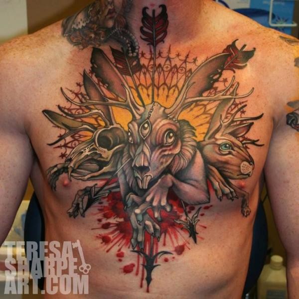 Interesting looking bloody mystical animals tattoo on chest with arrow