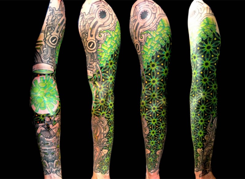Interesting looking colored sleeve tattoo of fantasy ornaments