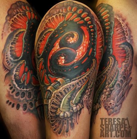 Interesting looking colorful fantasy tattoo