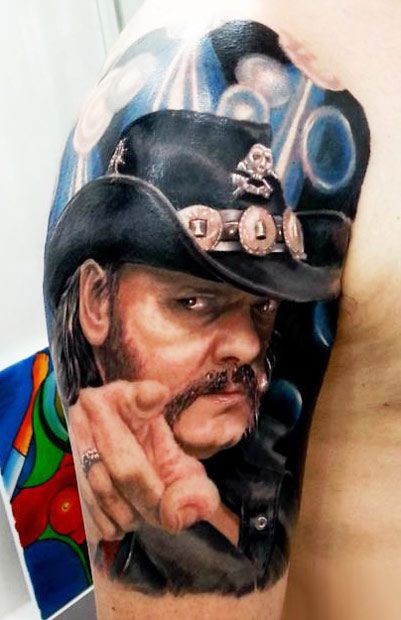 Interesting very realistic colored cool musician tattoo on shoulder
