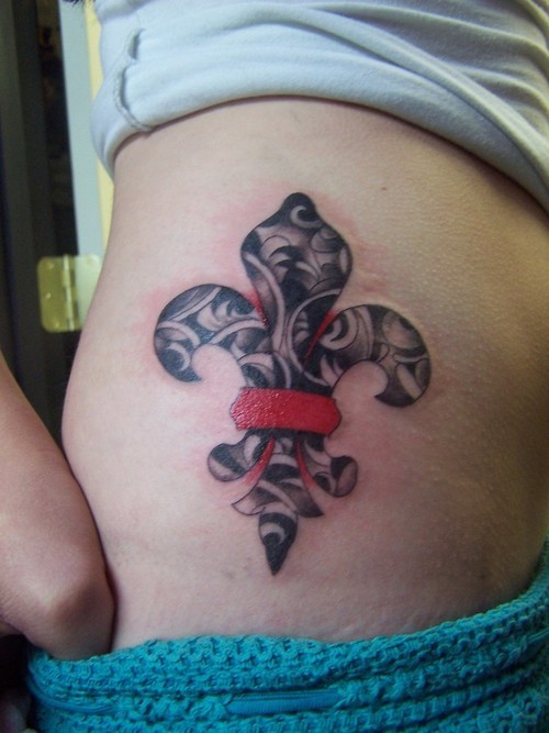 Inwrought black red fleur de lis tattoo