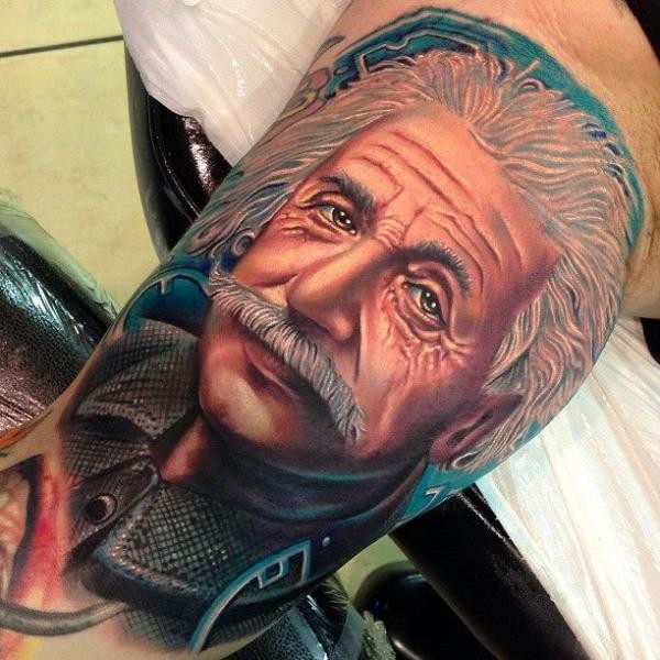 Isaac Newton colored portrait tattoo on biceps in realism style