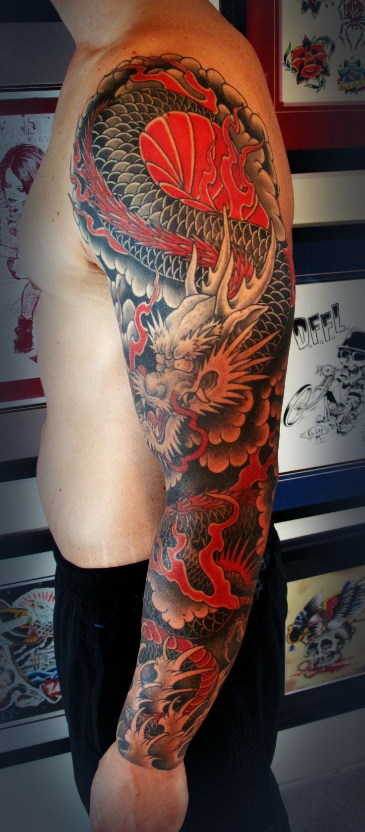Japanese red dragon tattoo on whole arm